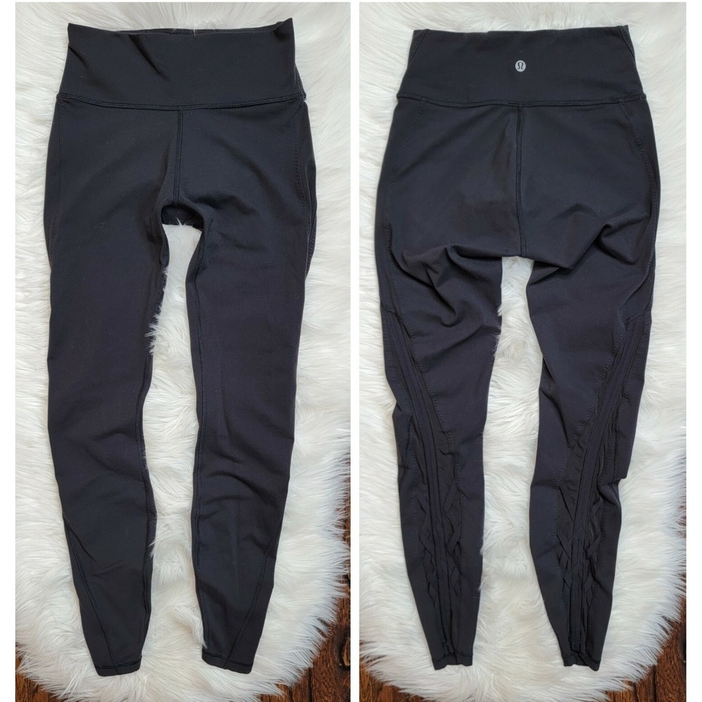 Lululemon Essential Rhythm‎ Black Leggings Women's size 6 Yoga Mesh Criss Cross